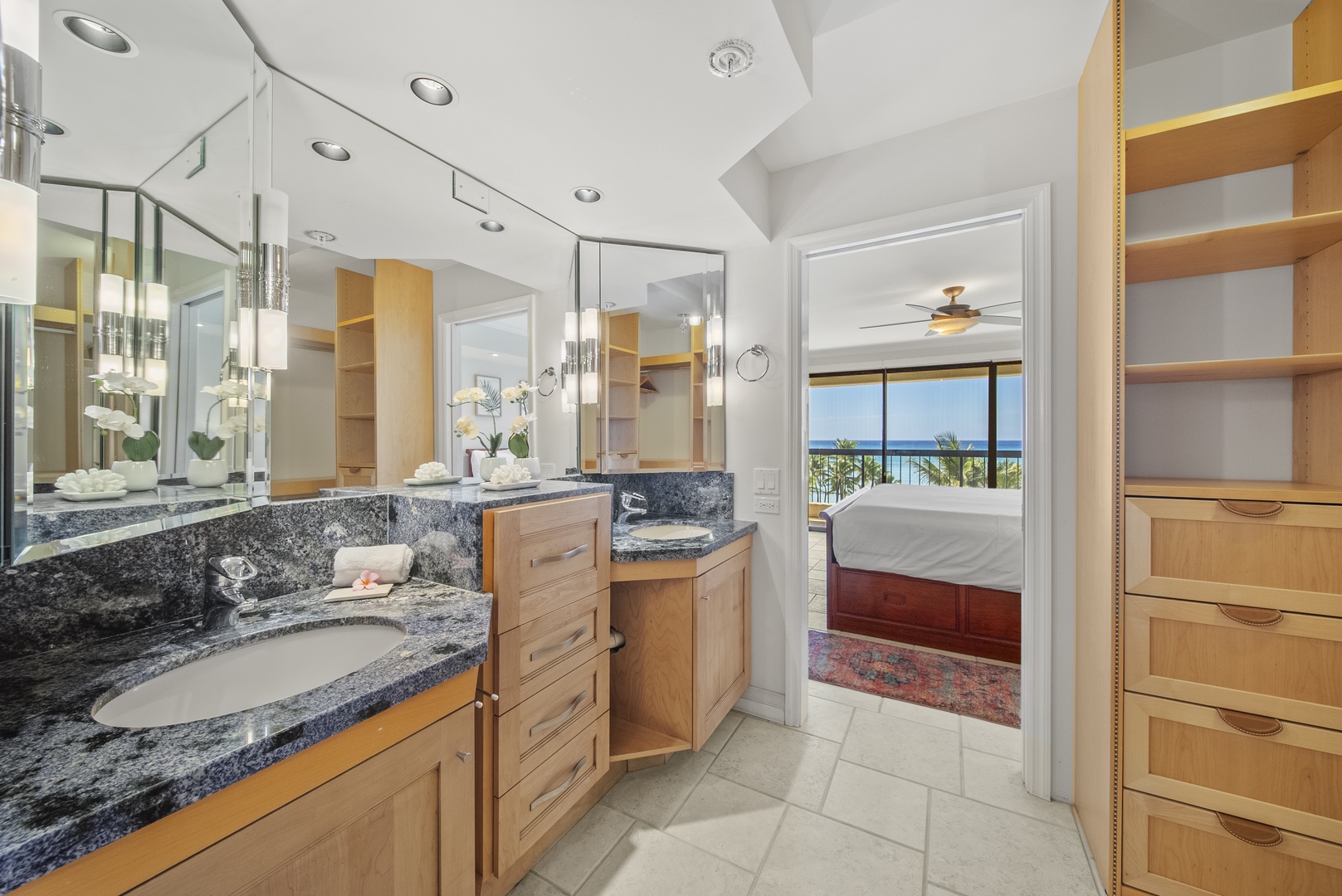 Honolulu Vacation Rentals, Aston Waikiki Beach Tower 602 - Immerse yourself in a luxurious ensuite main bathroom, offering dual vanities and a spa-like atmosphere.