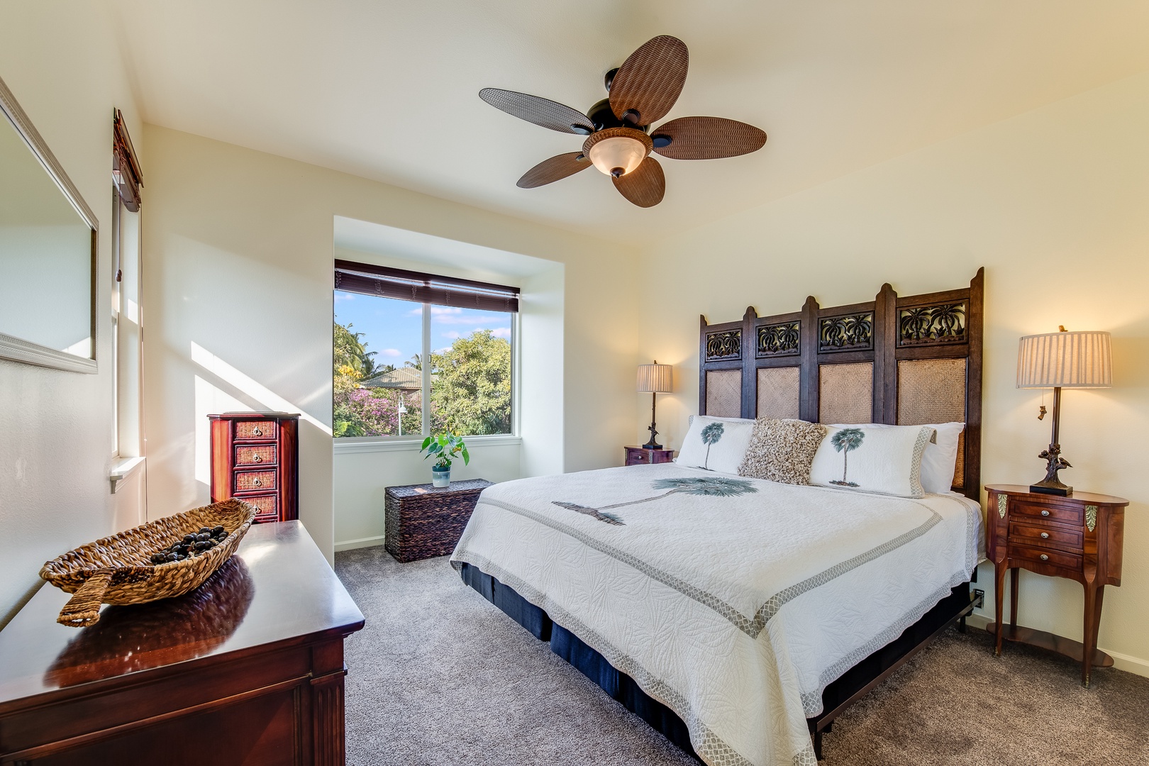 Kamuela Vacation Rentals, Mauna Lani Fairways #204 - Elegant guest bedroom features a plush king-size bed, ceiling fan, and large windows for restful sleep and natural light.