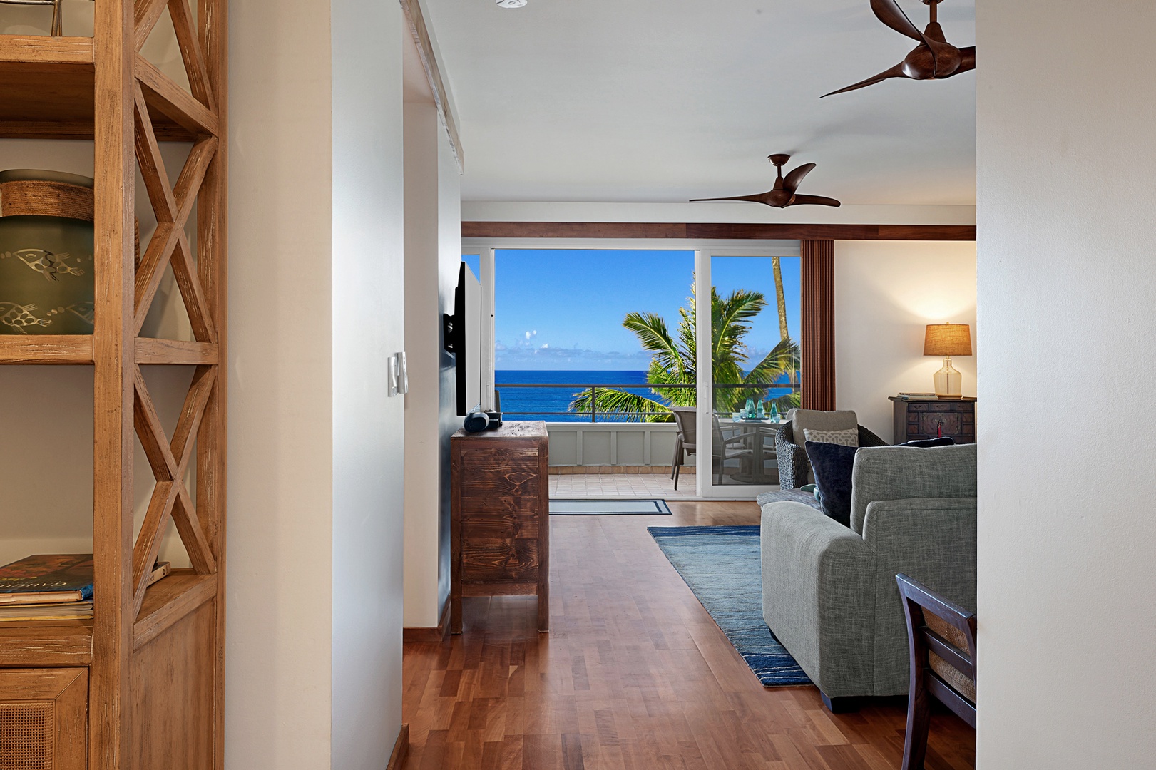 Koloa Vacation Rentals, Whalers Cove #133 - Cozy reading nook with stunning ocean views and natural light.