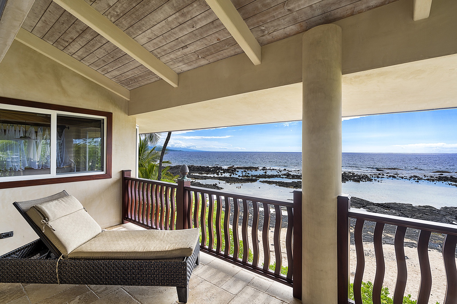 Kailua Kona Vacation Rentals, Mermaid Cove - Private Lanai on the top floor off the primary bedroom.