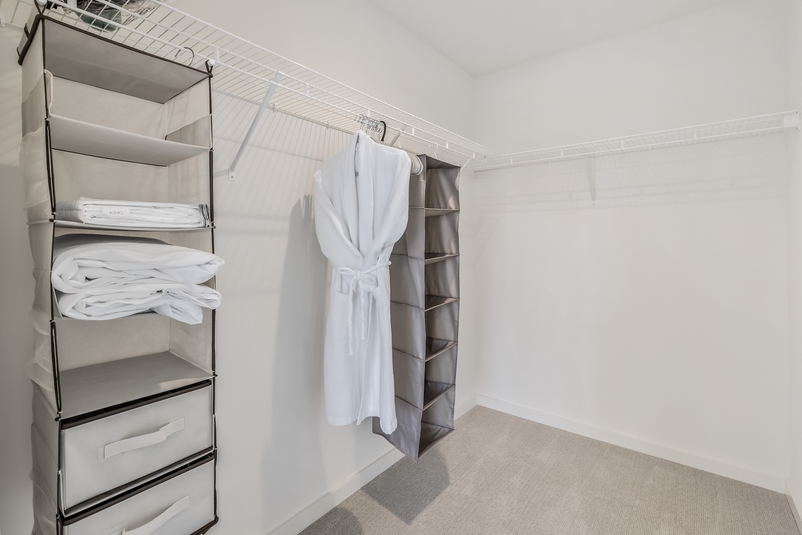 Honolulu Vacation Rentals, Sky Ala Moana #1701 - Spacious walk-in closet with plenty of storage, including shelves and hanging space, perfect for an extended stay.