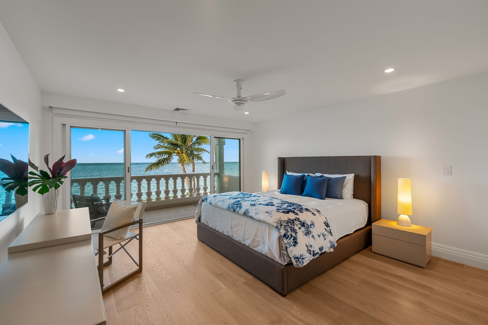 Kailua Vacation Rentals, Lanikai Sunrise Estate - Cozy suite with stunning beach views, a king bed, and sliding doors to your personal balcony retreat.