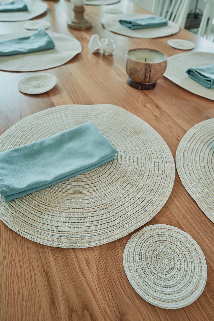 Princeville Vacation Rentals, Hale Kai - Your meals await at this beautifully set table with woven placemats and sage linens.