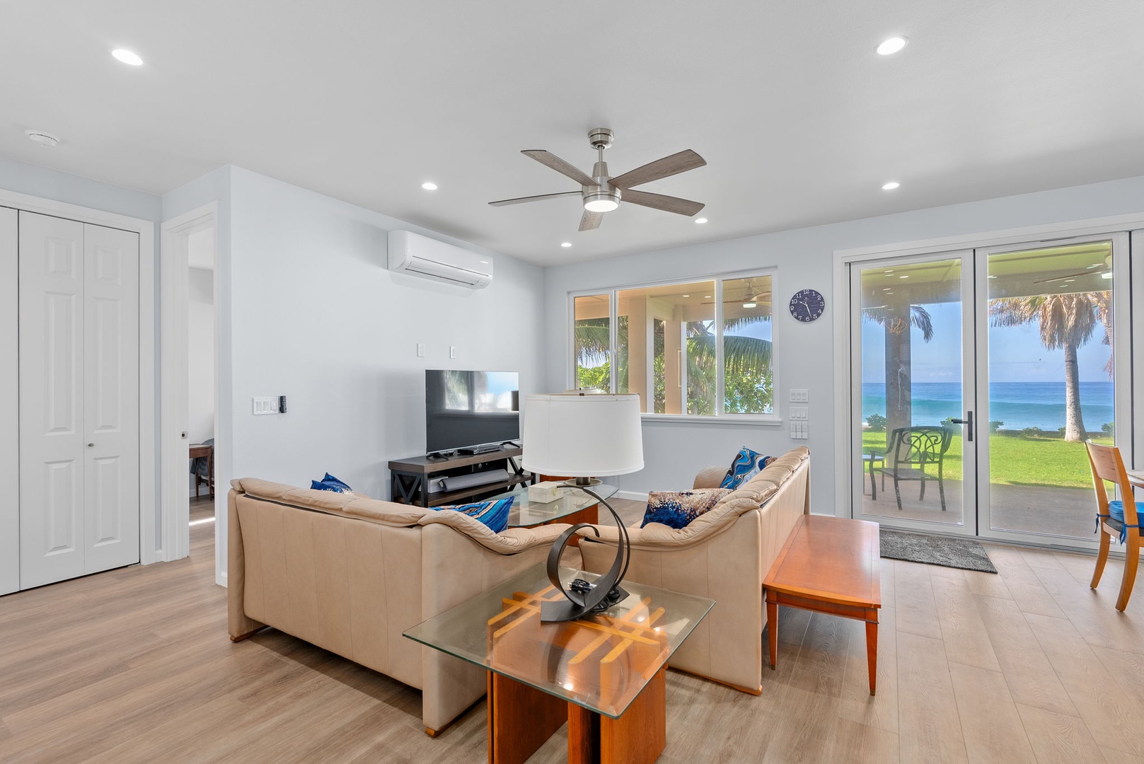 Waianae Vacation Rentals, Oceanfront Luxury Dream Estate - Comfortable sitting area with sliding glass doors that open to the sea and garden.