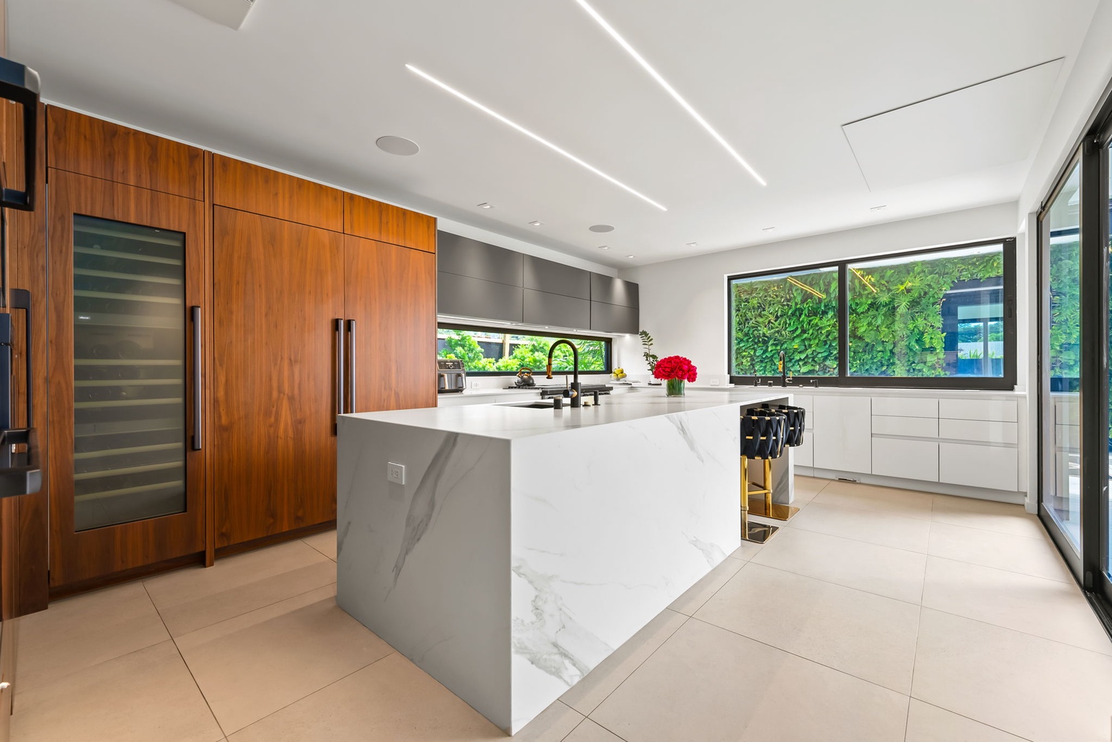 Honolulu Vacation Rentals, Ocean Villa Emilie - Dual-tone cabinetry and waterfall-edge counters elevate everyday moments into refined experiences.