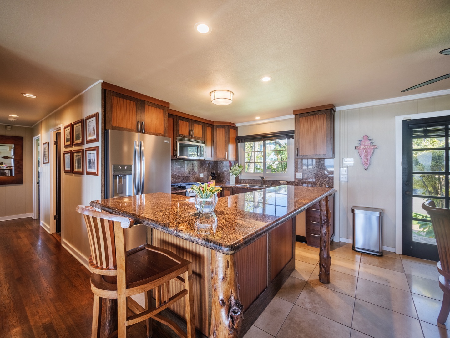Haleiwa Vacation Rentals, Sunset Point Hawaiian Beachfront** - Fully-stocked kitchen with a breakfast bar for quick meals.