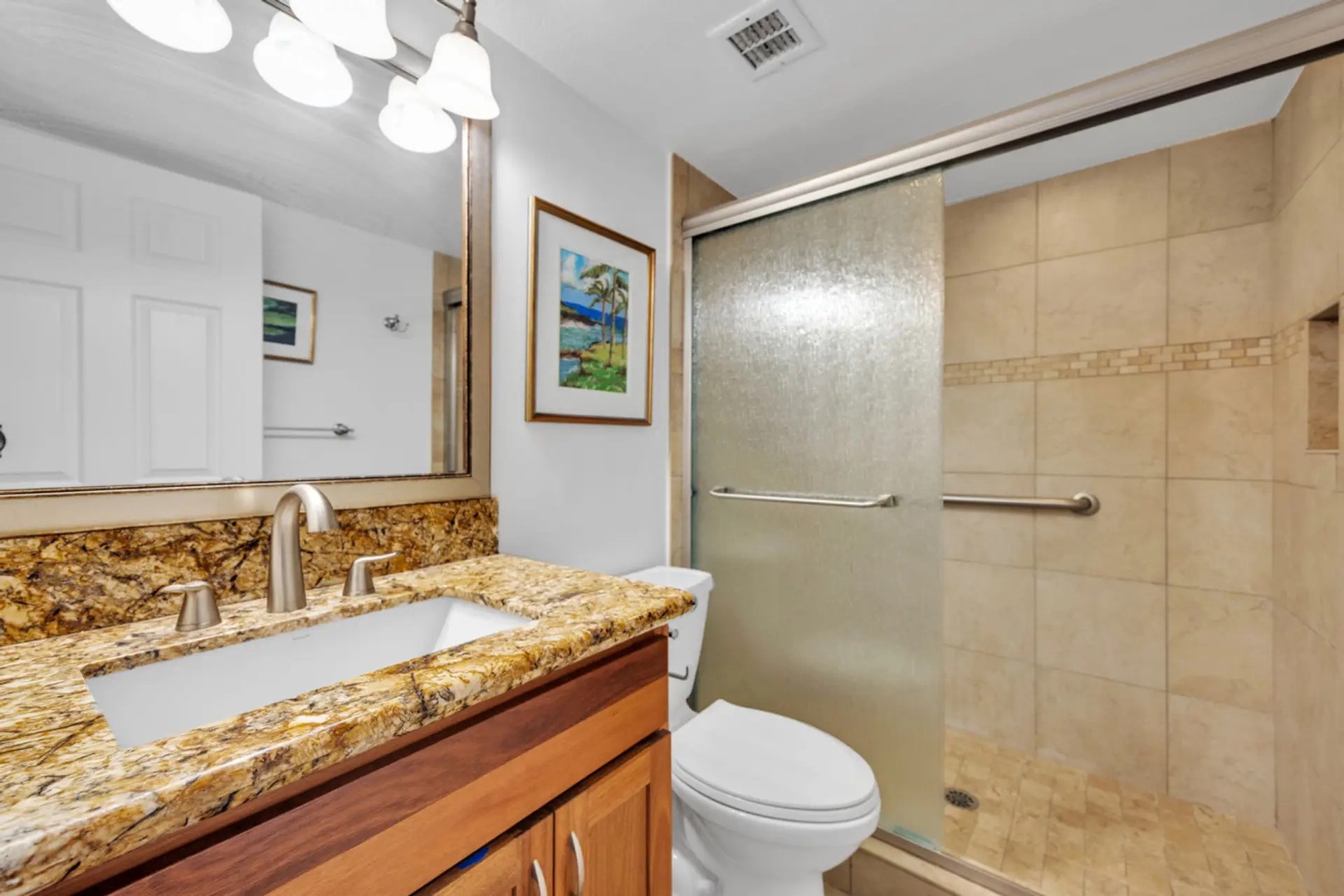 Kihei Vacation Rentals, Maui Banyan H306 - Rinse the salt off in the walk-in shower, then get ready at the granite vanity.