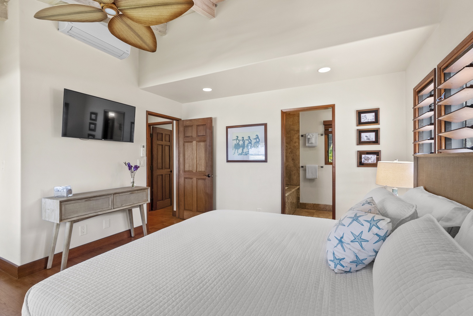 Haleiwa Vacation Rentals, Maluhia Beach House - Bright and airy bedroom with a king-size bed and tropical-inspired décor.