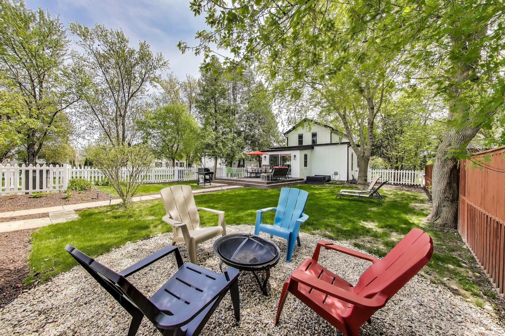 Fenced-in Backyard with Fire Pit