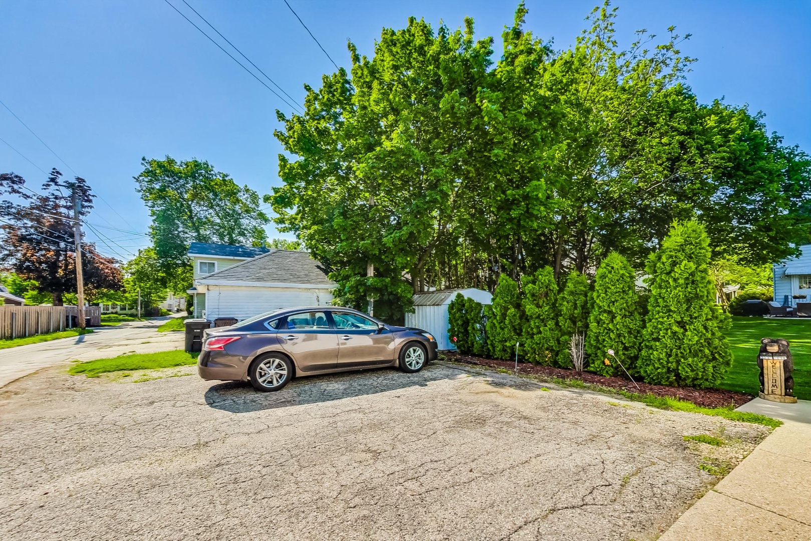 3 Parking Spots + 1 Parking Spot Parallel with Coach House