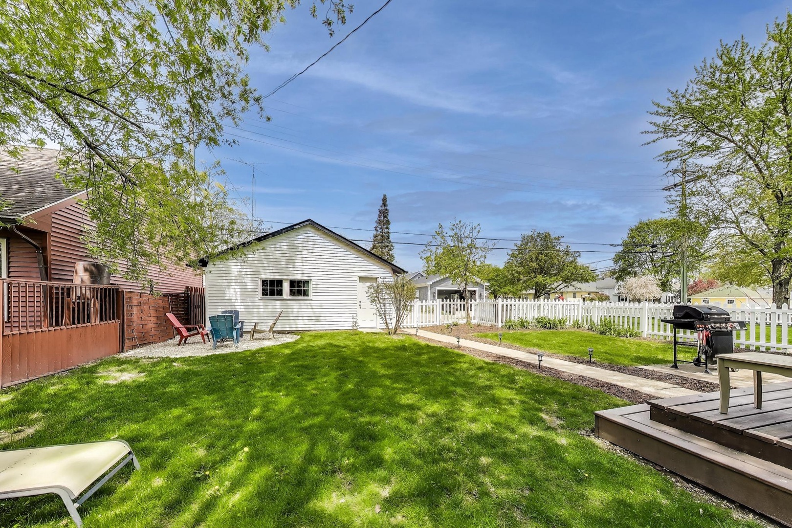 Plenty of Room for Backyard Games and the Kids to Play in Fenced-in Yard