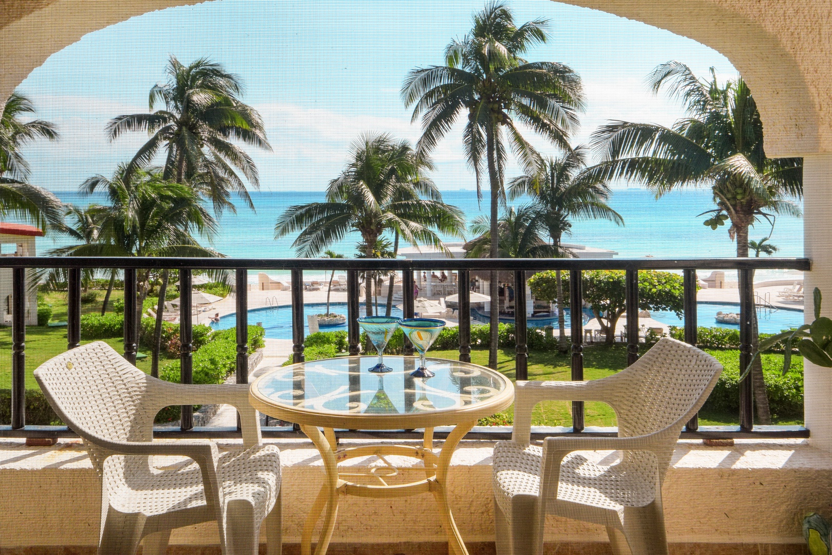 Tropical 2BR Condo with Pool & Caribbean Views