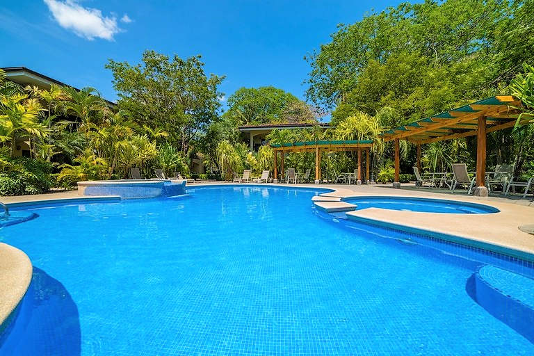 Palm Tree Resort w/ Pool, 5 Min Walk to 3 Beaches!