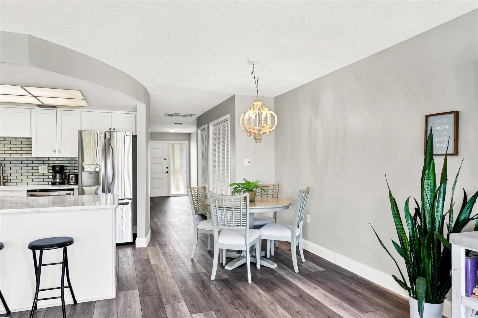 Your bright, open-concept space flows seamlessly from kitchen to dining, with modern touches and natural light creating the perfect setting for memorable meals.