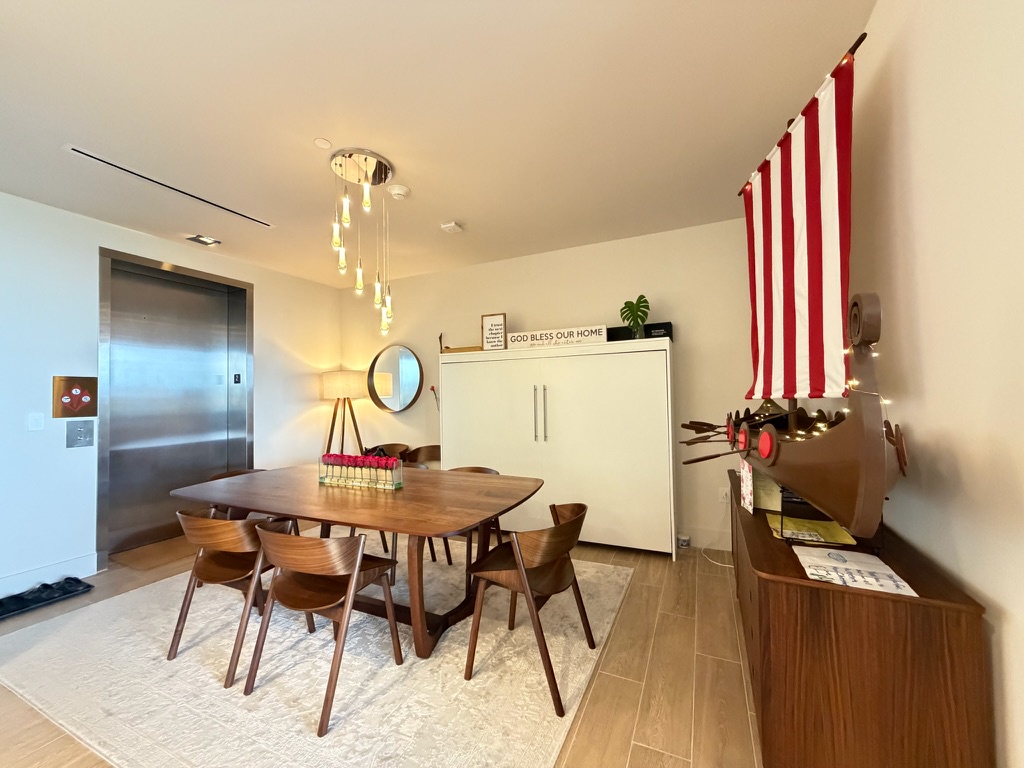 St. Regis Residence 207 by FVC - Dining Room w/ Murphy Bed
