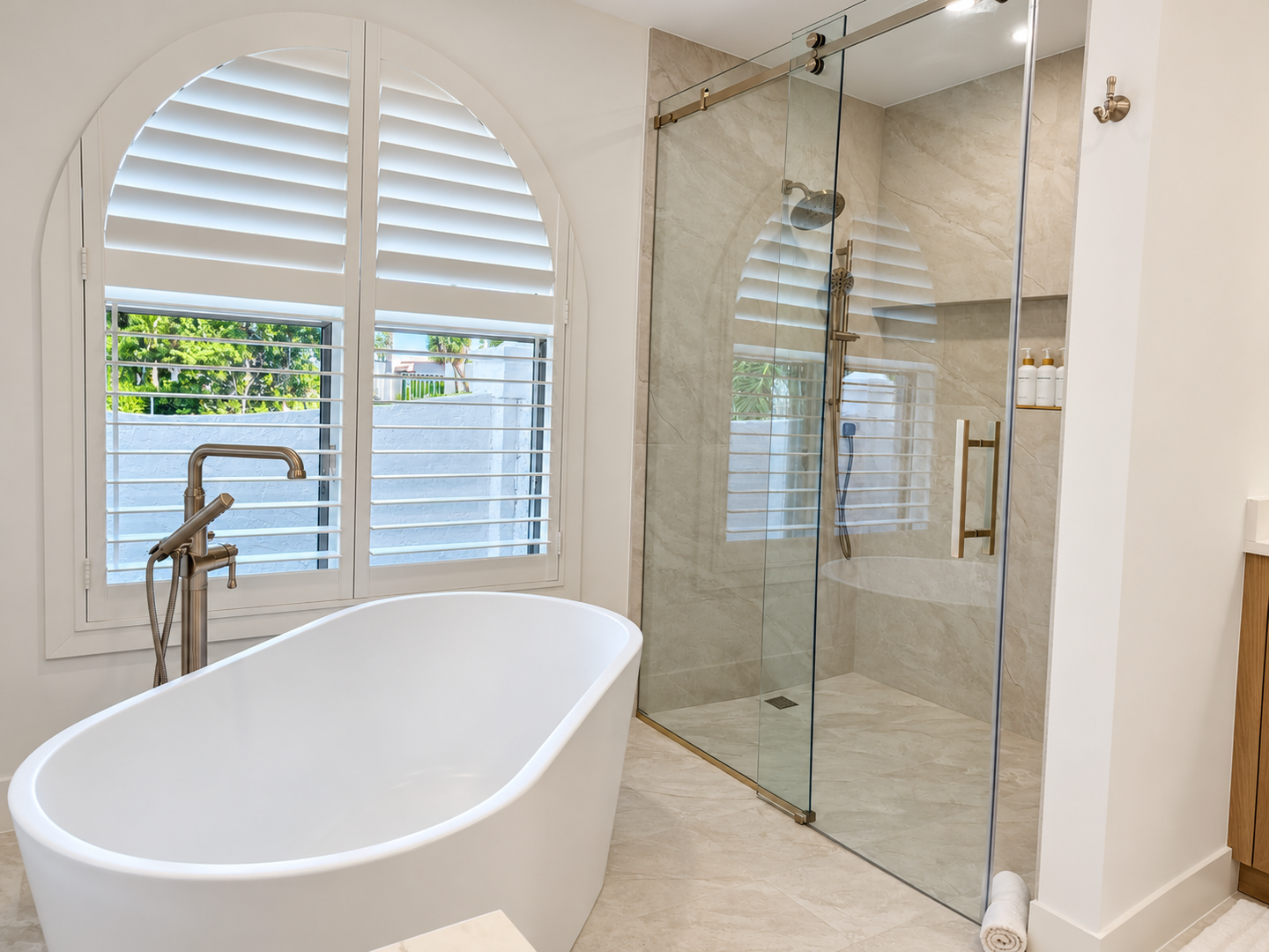Bright bathroom with glass shower (1)