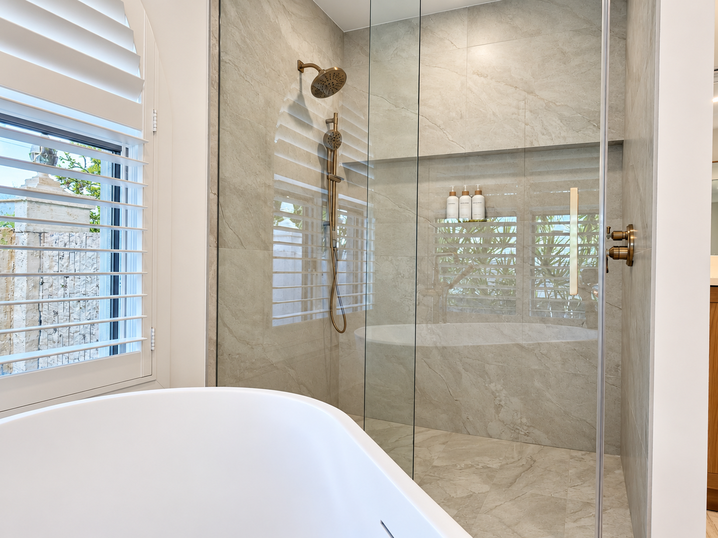 Bright, polished stone bathroom-4