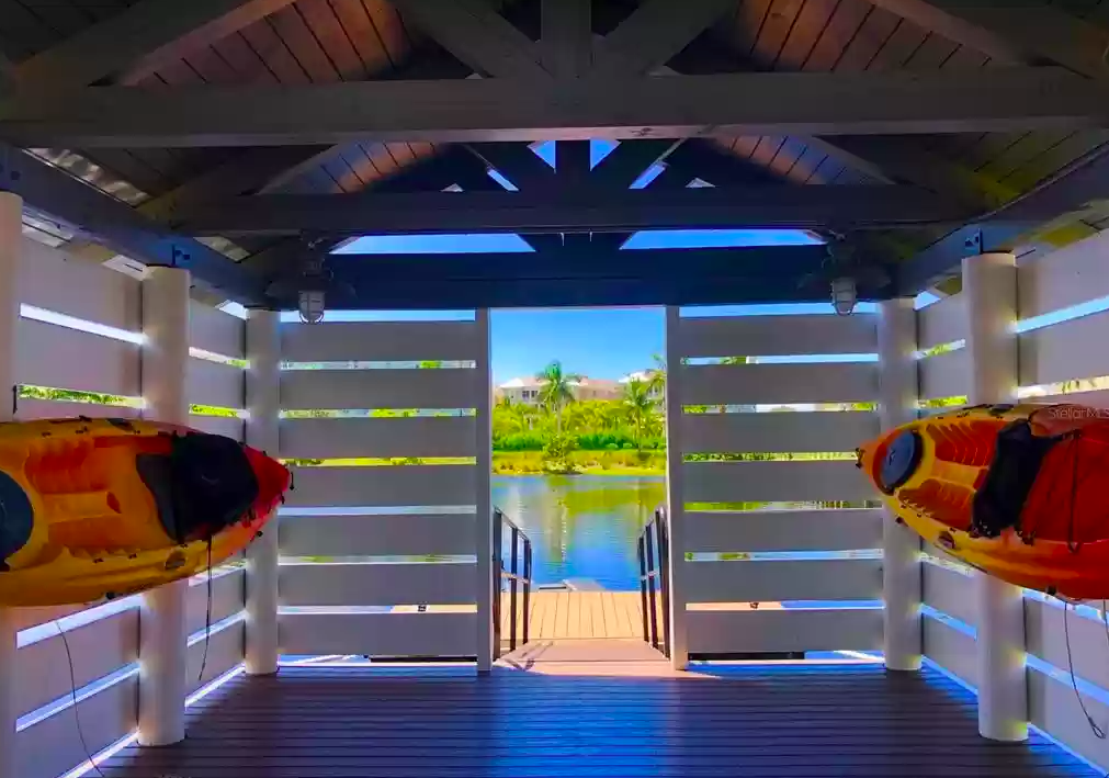 Step into your private boathouse with kayaks ready for adventure on tranquil waters just outside your door.
