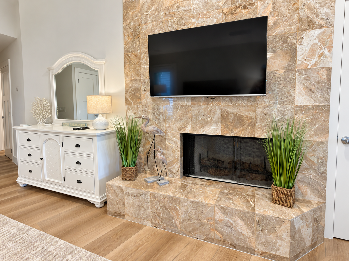 Polished bedroom interior with fireplace