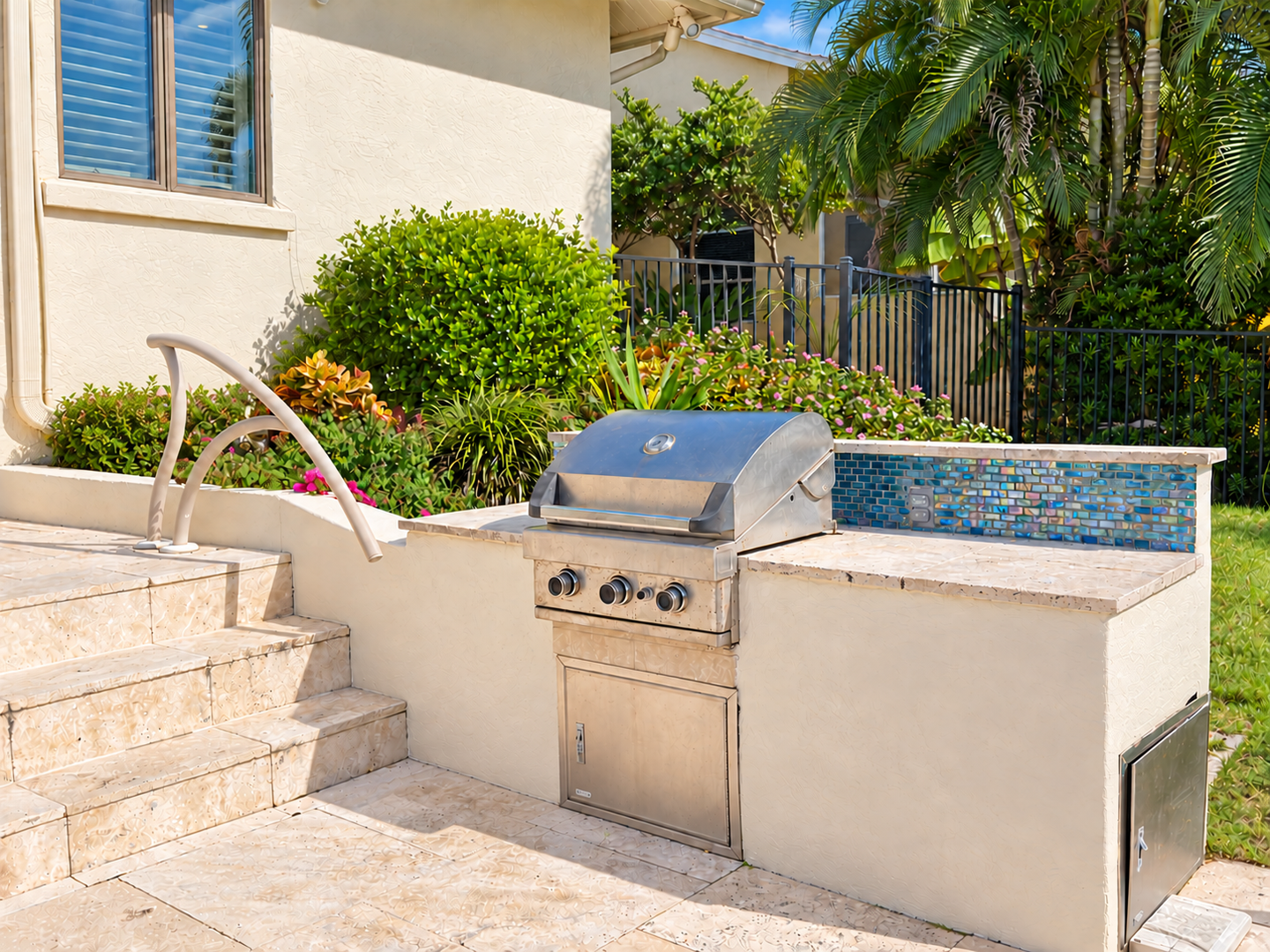 Cleared patio beside curved handrail