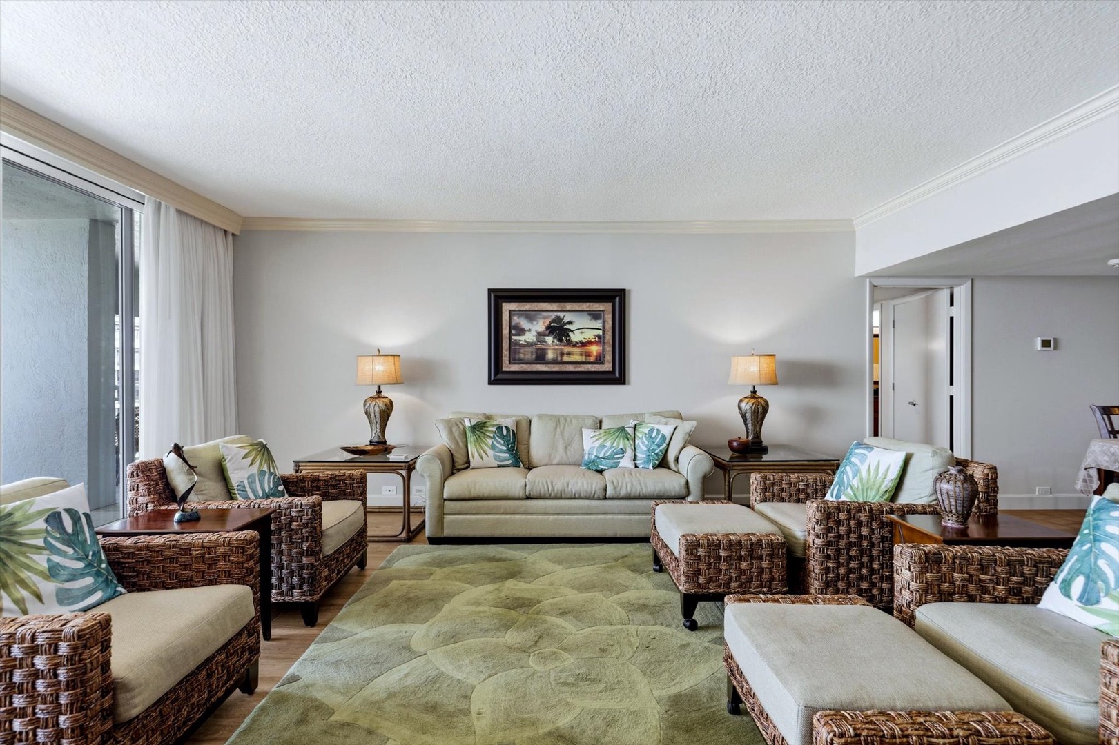 Sink into tropical comfort with wicker furnishings and coastal accents that create your perfect beach getaway retreat.