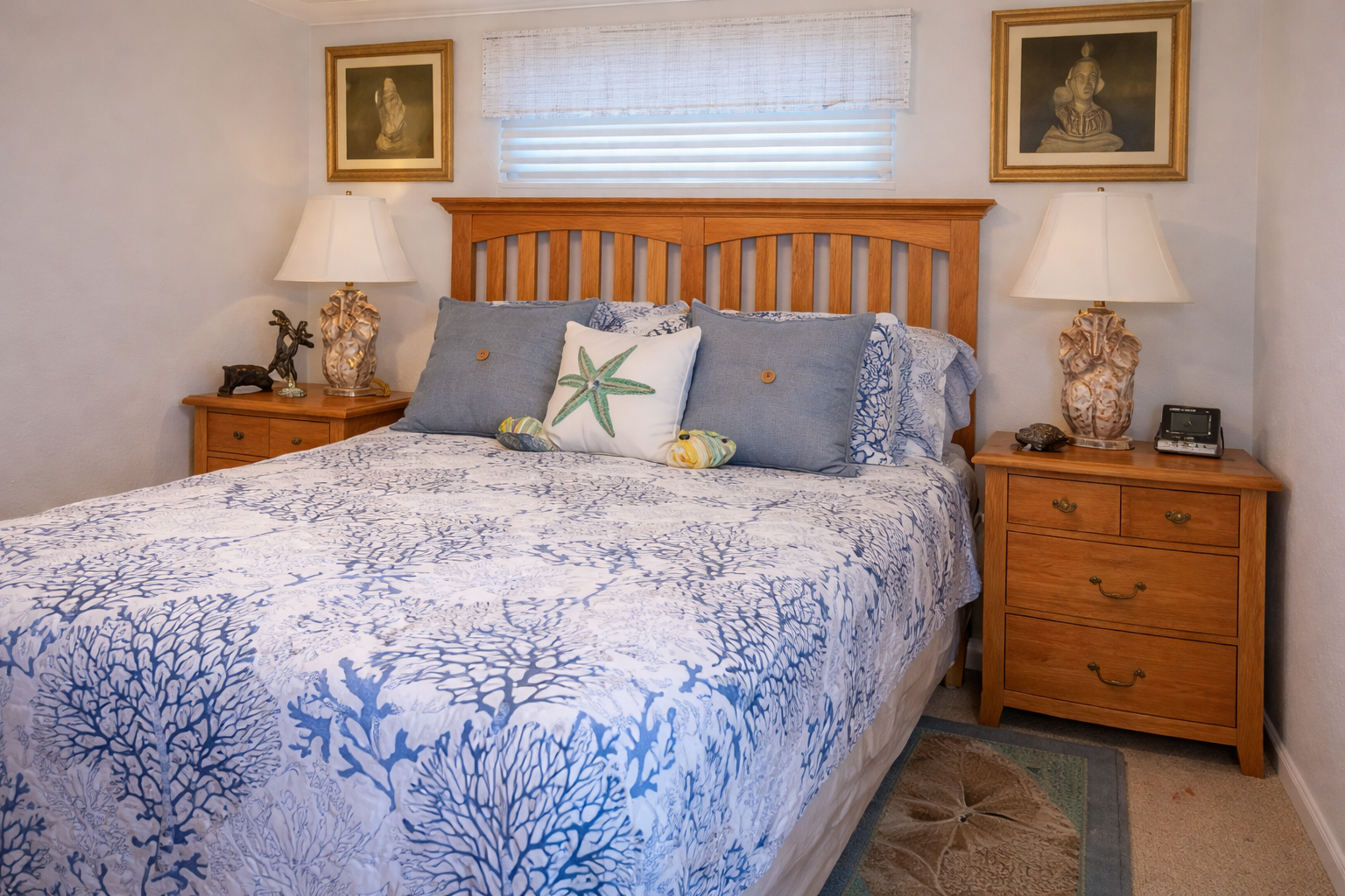 Drift off to sleep in your coastal-themed bedroom with ocean-inspired linens and warm wood furnishings creating the perfect seaside retreat.