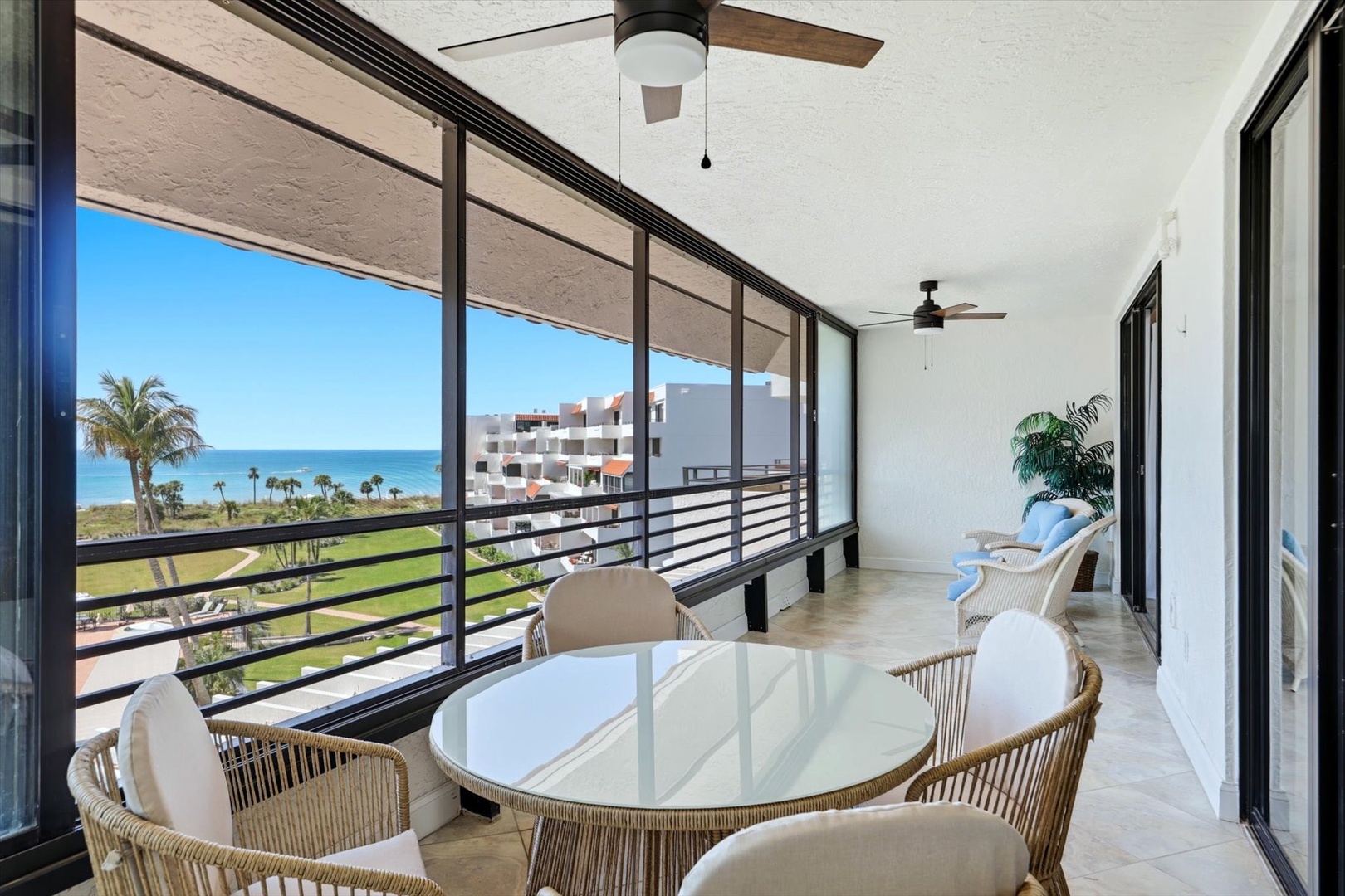 Your private balcony offers stunning ocean views where you can dine al fresco while watching waves crash against pristine shores.