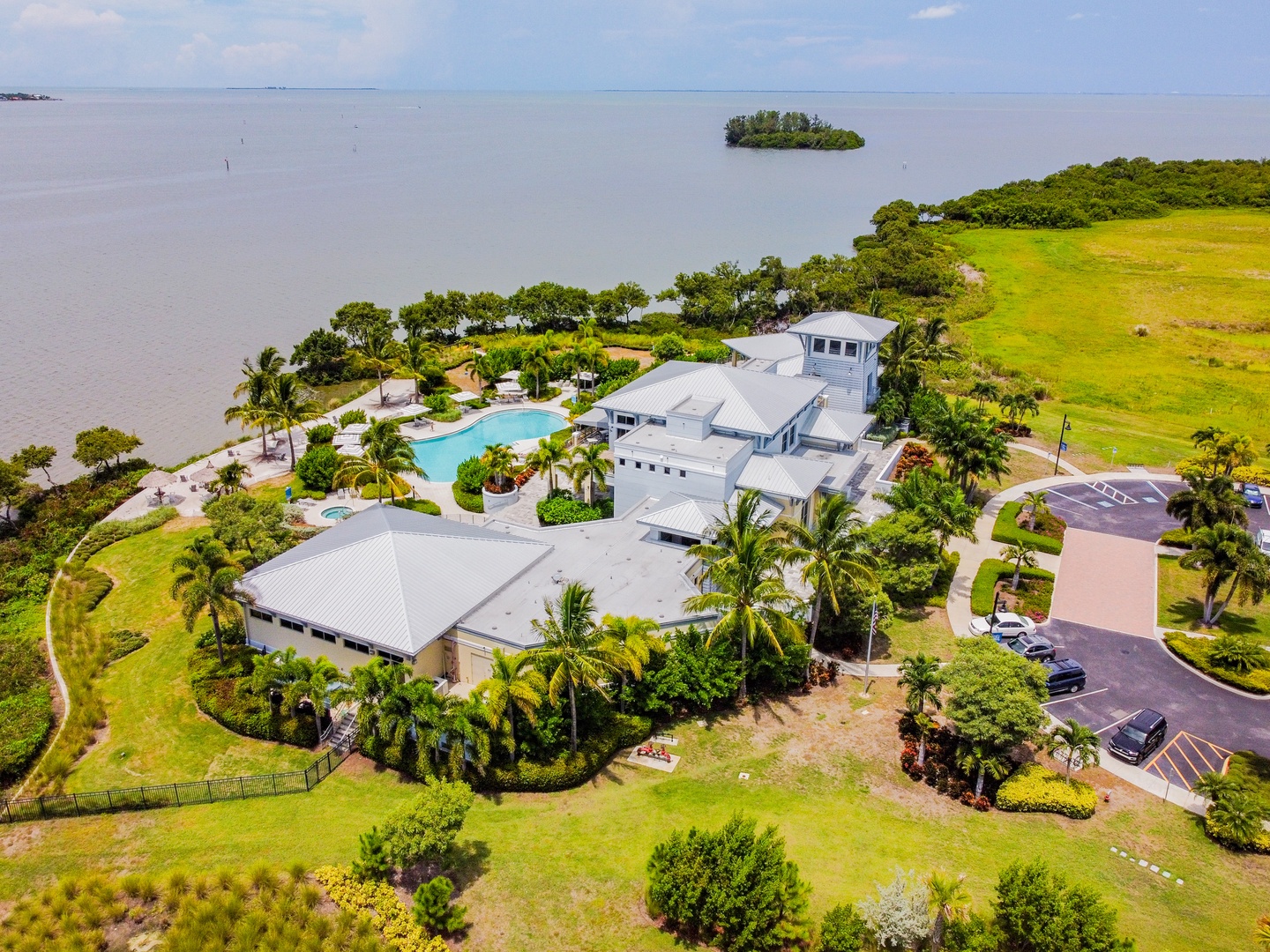 Stunning waterfront estate with private pool and tropical gardens set on expansive grounds overlooking pristine waters.