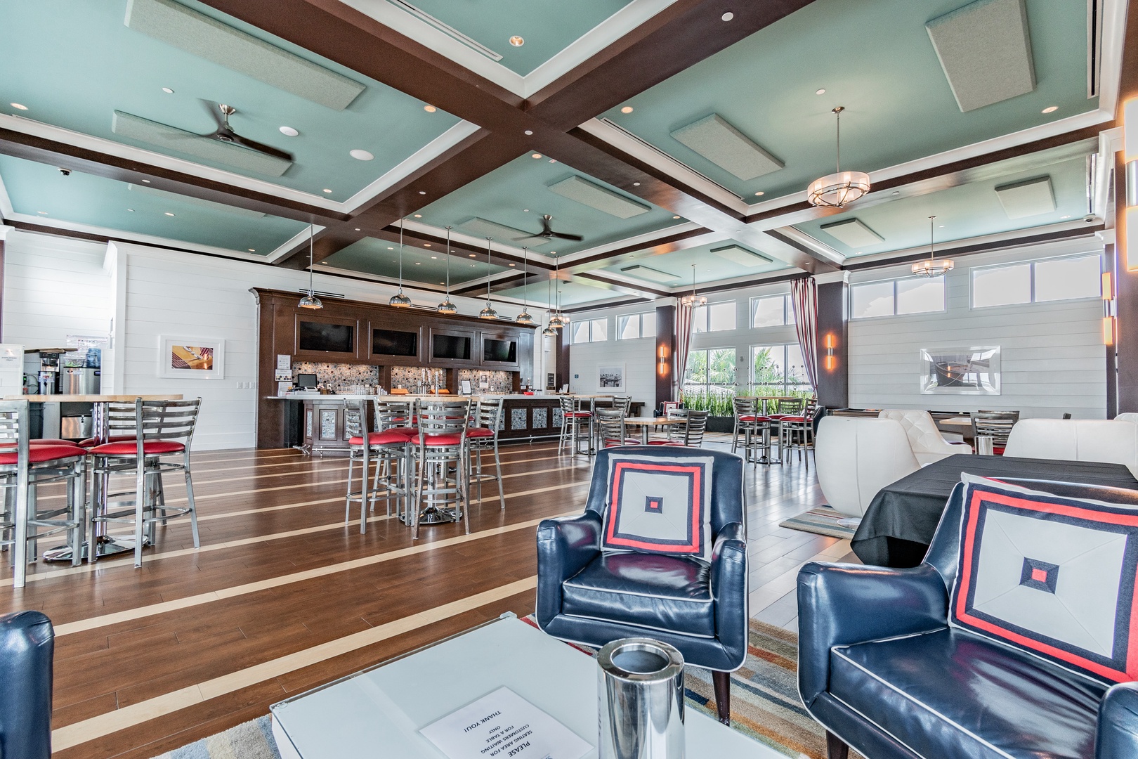 Relax in the elegant lounge where rich wood beams frame comfortable seating and your refreshments await at the stylish bar.