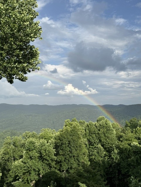 Beautiful Mountain View with Rainbow