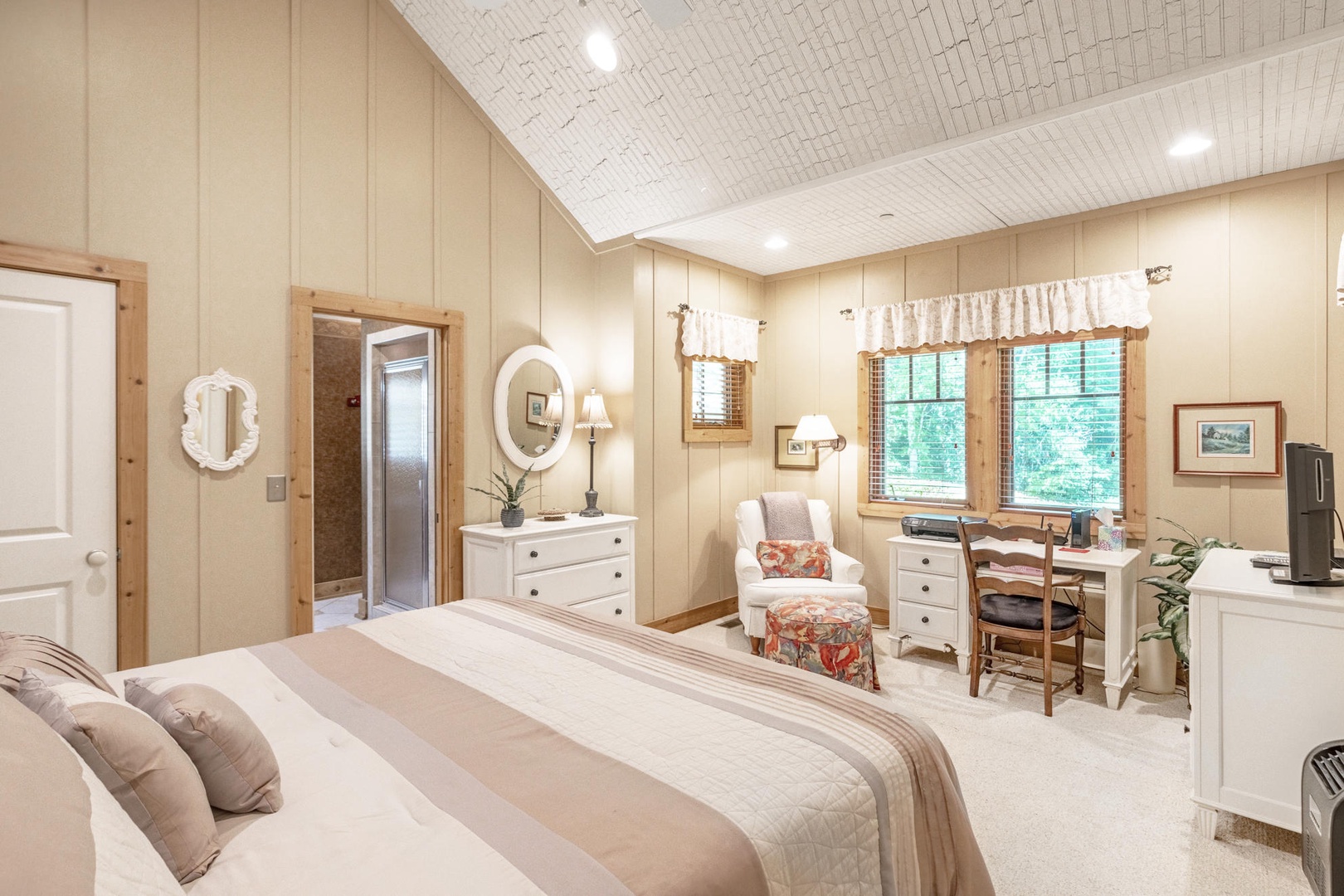 Primary Bedroom---King Size Bed, TV, Main Floor