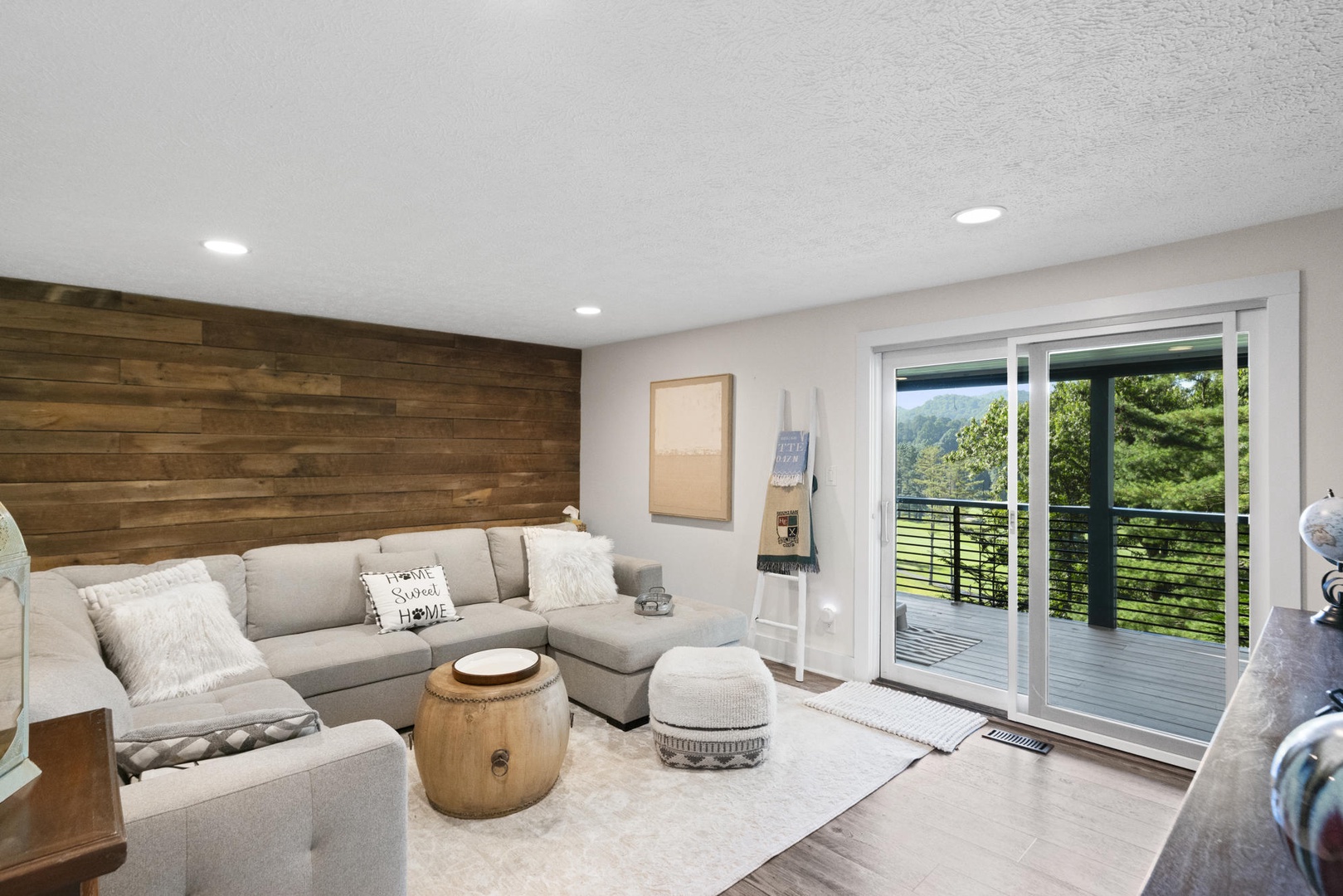 Living Space---Comfortable Seating, Television, Balcony Access, Downstairs