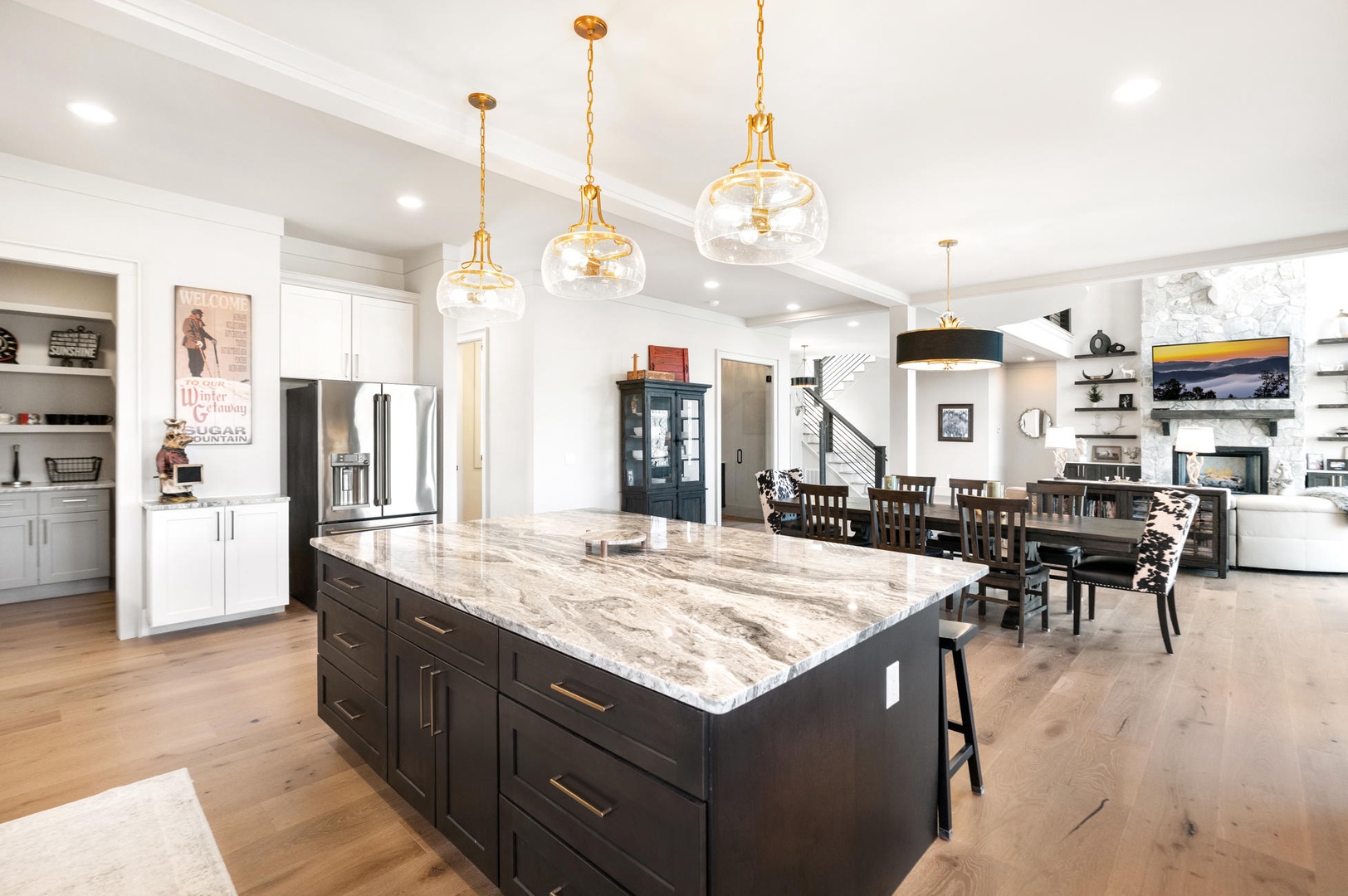 Your dream kitchen awaits with stunning granite countertops, elegant pendant lighting, and spacious open layout perfect for cooking and gathering.