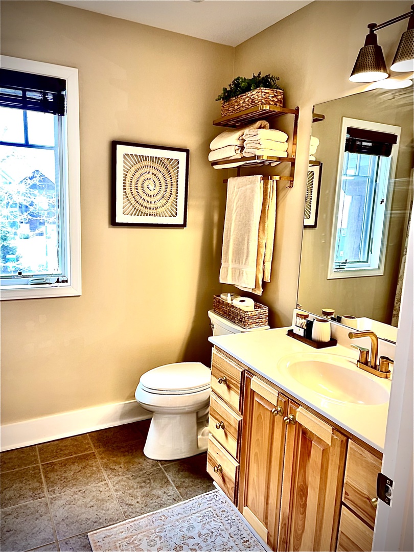 Clean, comfortable guest bath with everything you need.