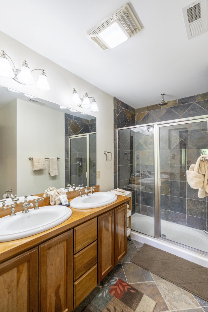 Primary Bathroom---Double Sinks, Tile Shower