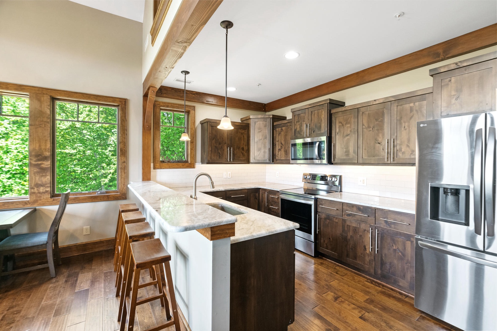 Kitchen---Granite Counter-tops, Stainless Steel, Additional Seating