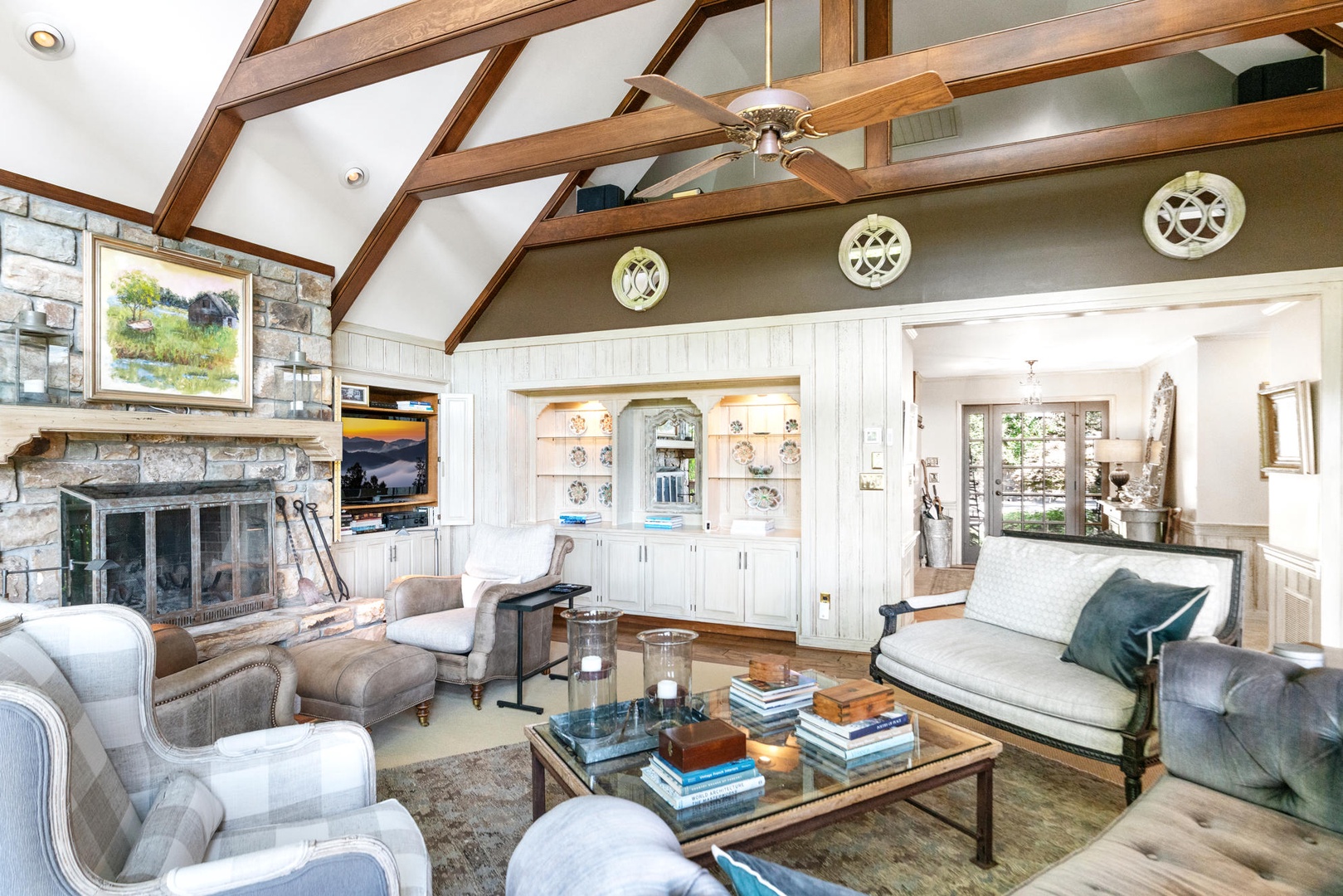Living Room---Cathedral Ceilings, Fireplace, Television