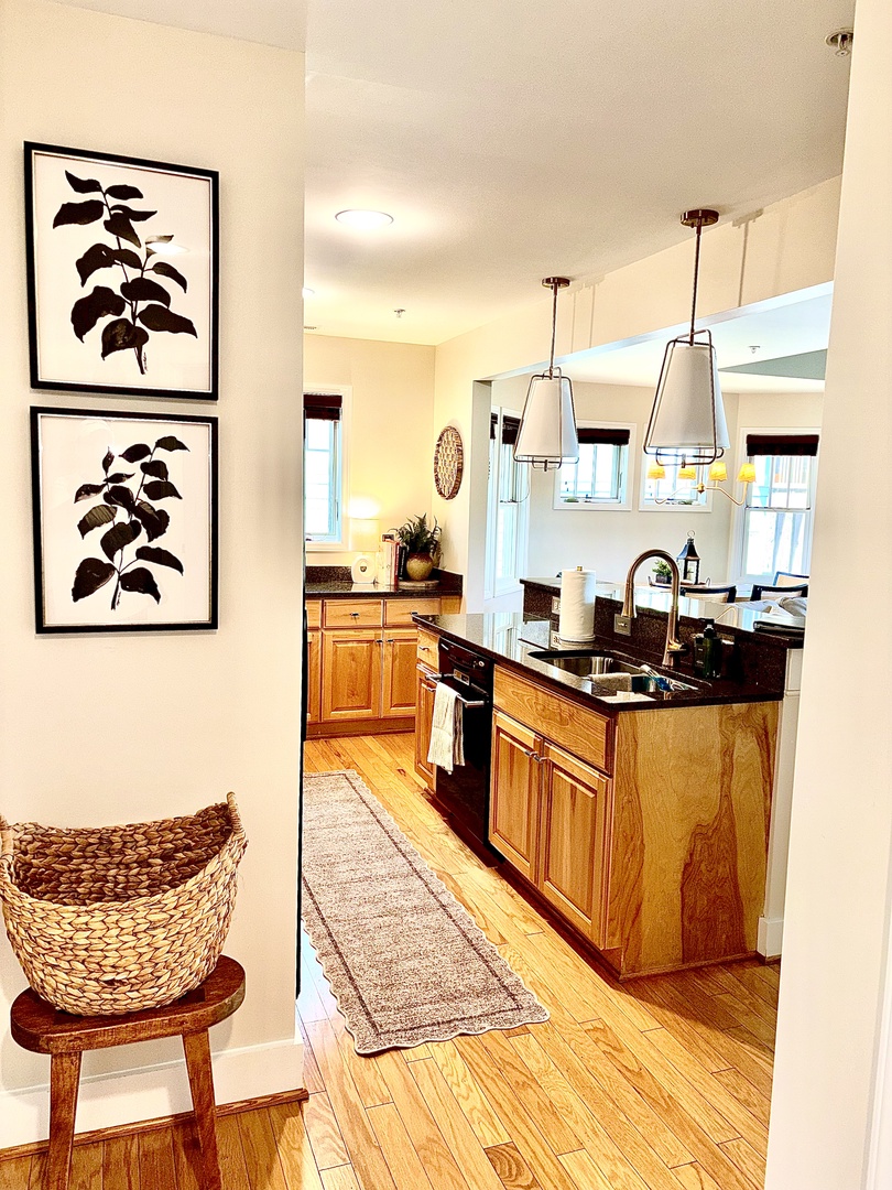 Fully equipped kitchen with everything you need, plus bar seating for easy meals.