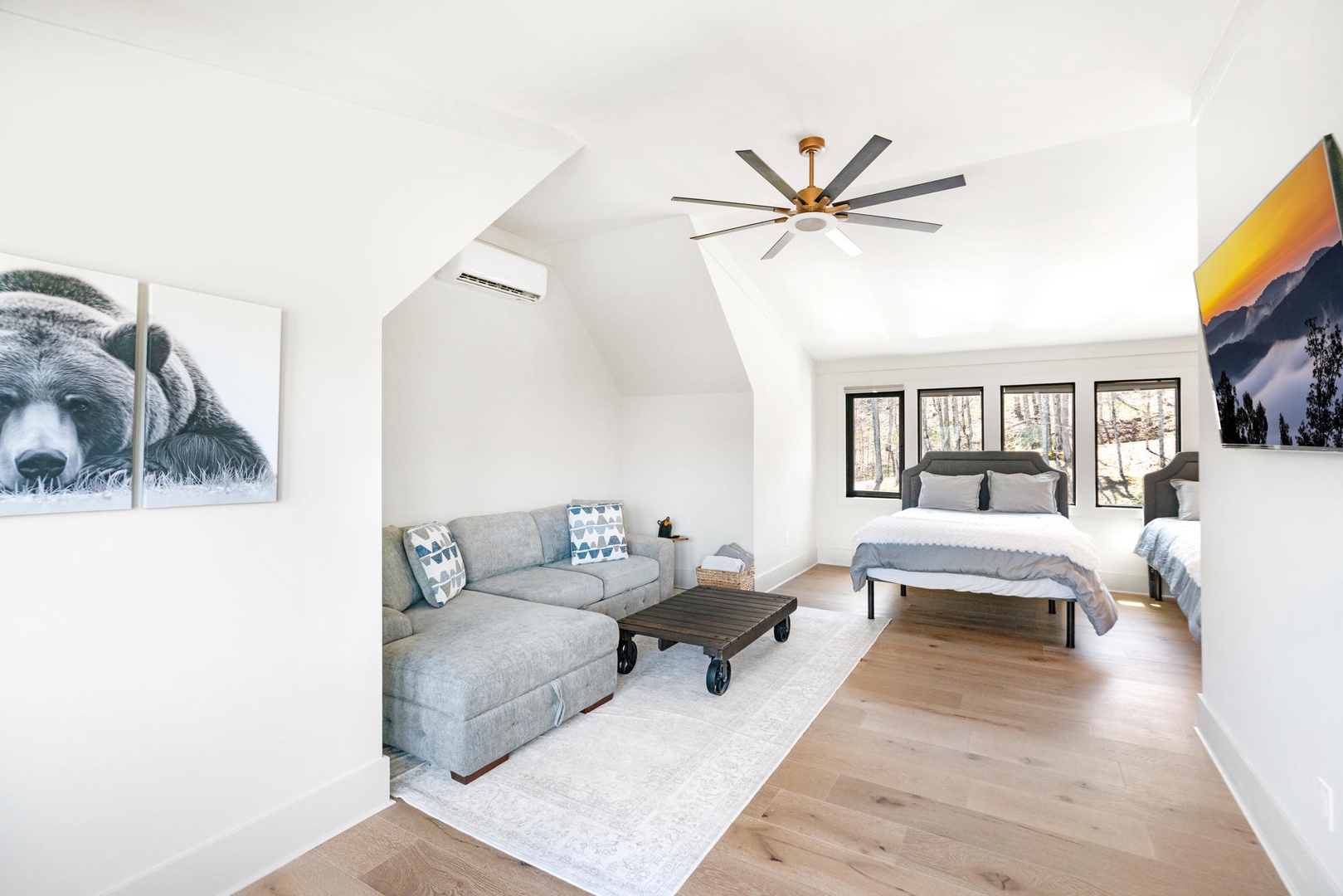 Relax in your spacious retreat with cozy seating and restful sleeping areas, all under soaring vaulted ceilings. Two queen beds and sleeper sofa, upstairs suite.
