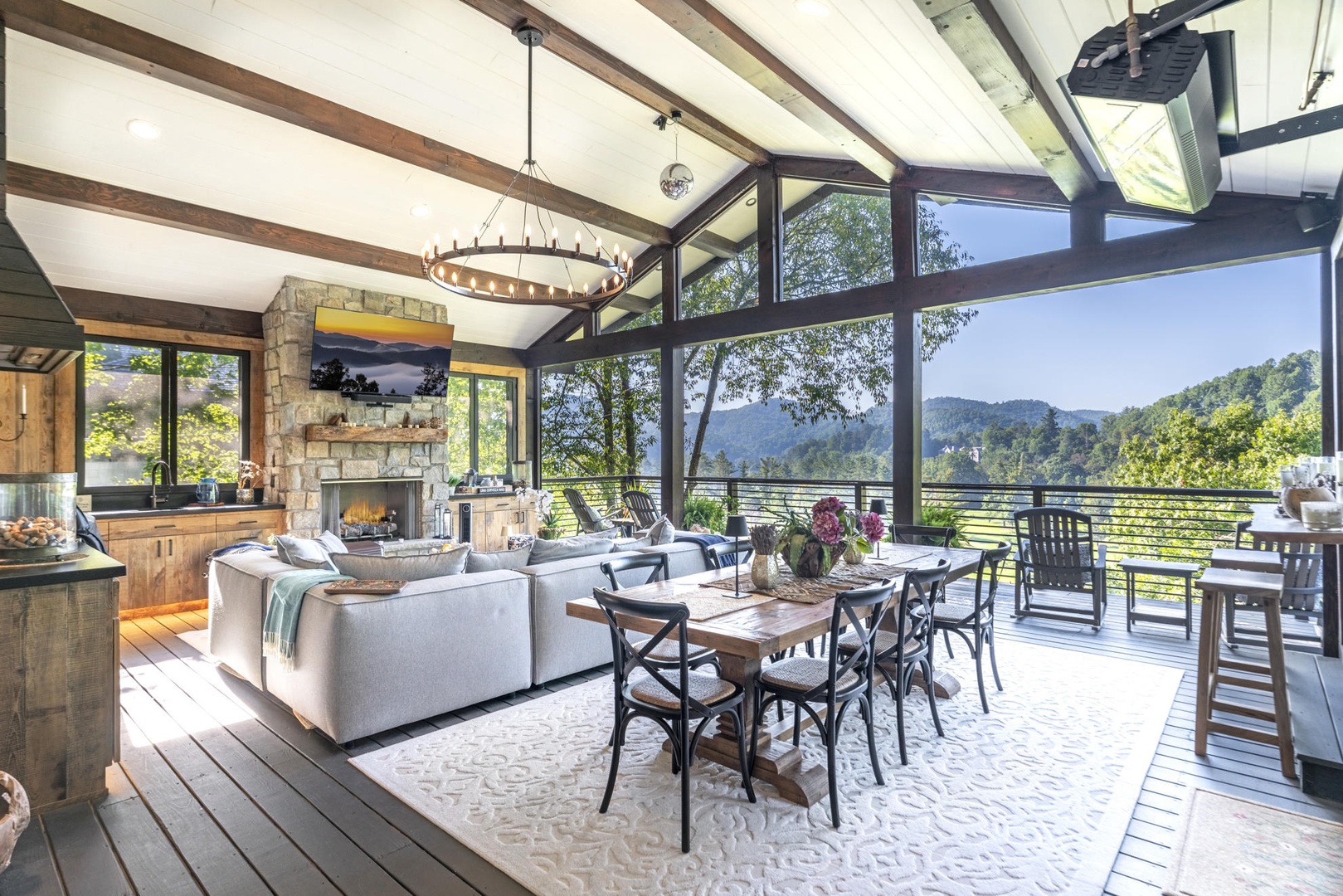 Indoor/Outdoor Living Room---Stunning View, Fireplace, Television, Comfortable Seating, Dining Area