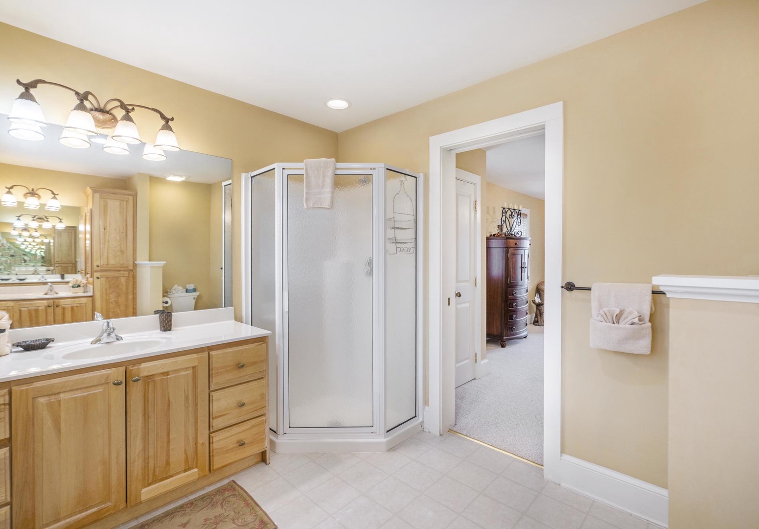 Primary Bathroom-- Double Sinks and Shower Stall