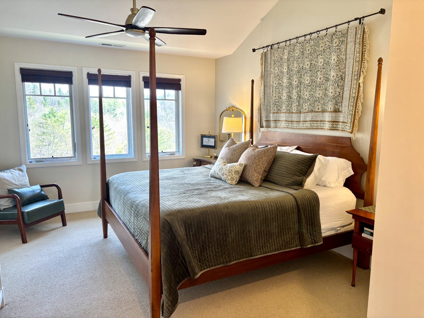 Spacious king suite with natural light and a peaceful mountain feel.