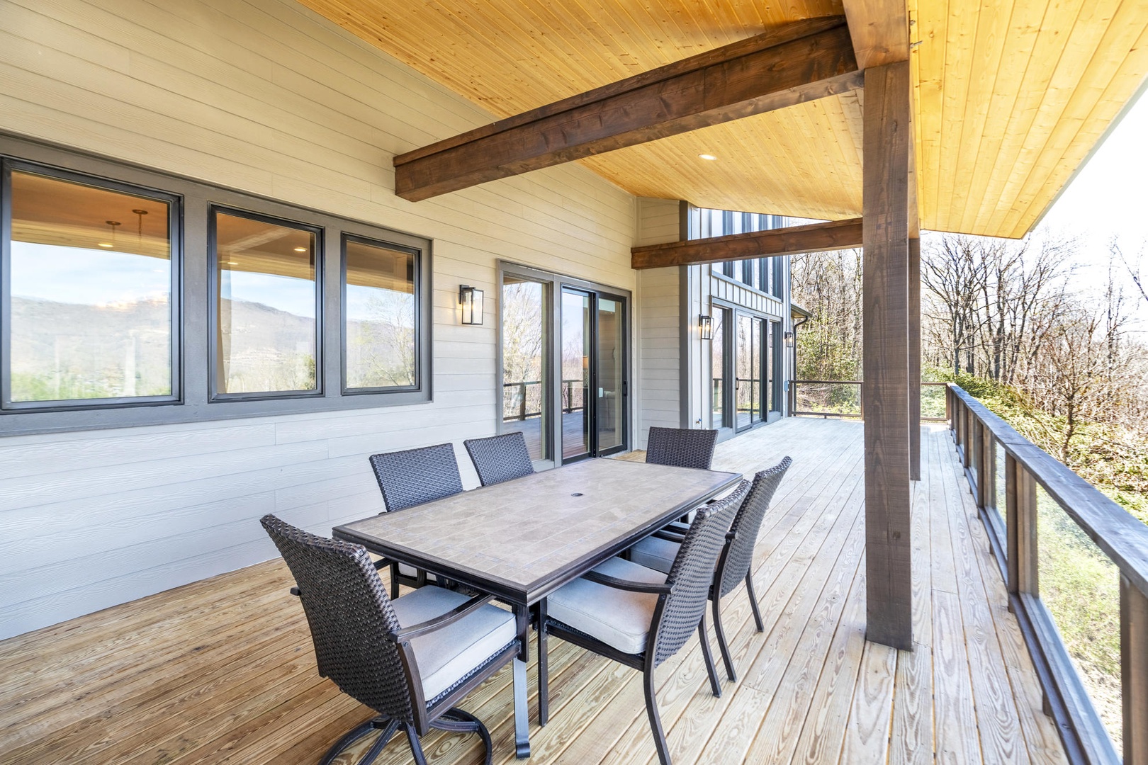 Gather around your private dining table on this covered terrace, where mountain views create the perfect backdrop for memorable meals together.