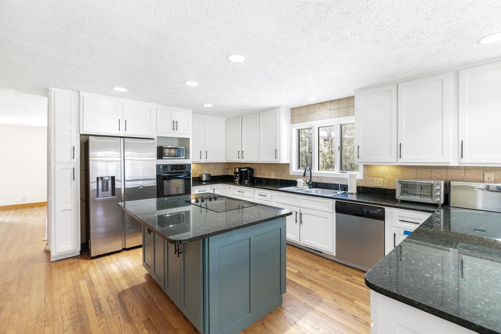 Kitchen---Granite Counter-tops, Stainless Steel, Spacious