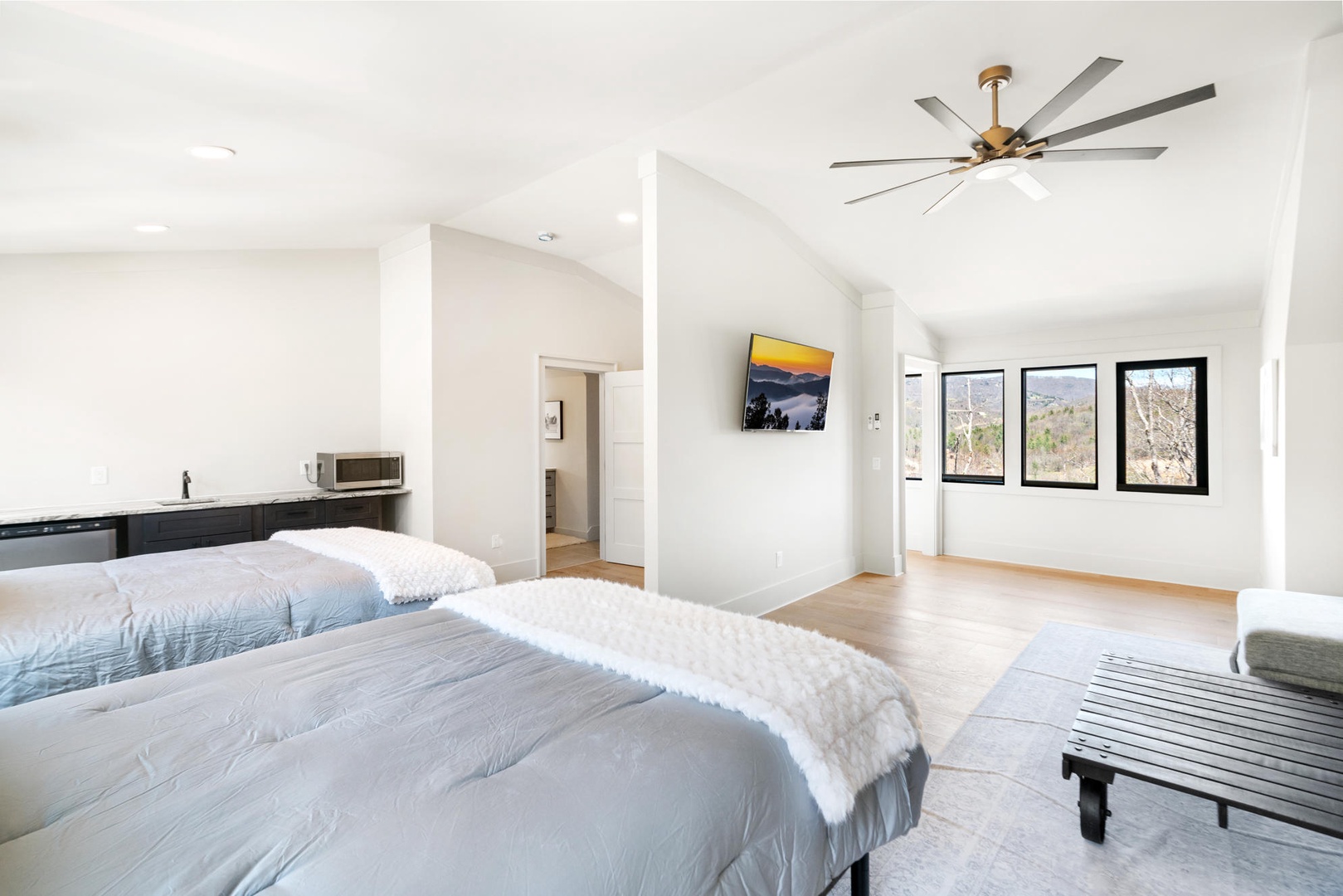 Rest peacefully in your spacious suite with queen beds and stunning natural views through floor-to-ceiling windows.