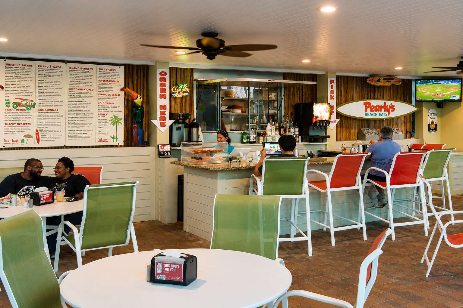 Step into this colorful beach eatery where island vibes and casual dining meet. Settle into your seat at the bar or a table, where tropical decor and a laid-back atmosphere set the tone for your getaway meal.
