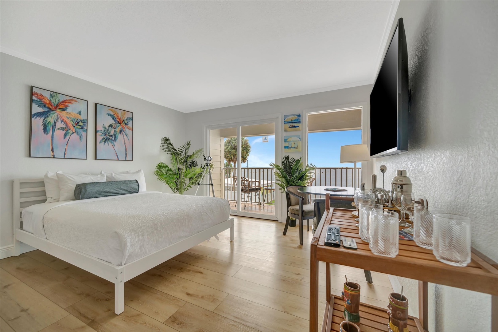Step into your sun-drenched coastal retreat where ocean breezes drift through open doors and peaceful waves set the rhythm for your days. This serene space offers direct balcony access to stunning blue horizons—your perfect escape.