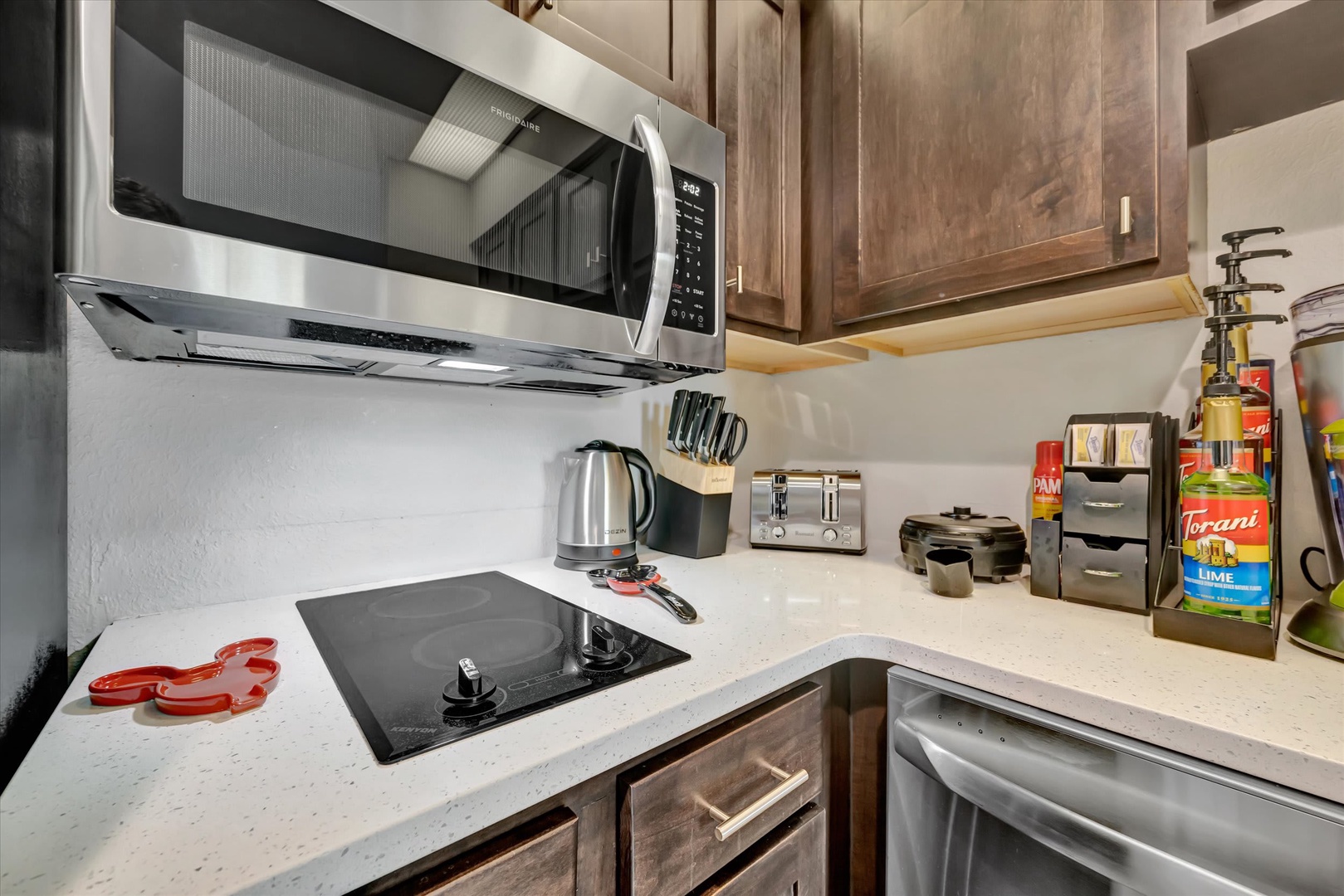 Your fully equipped kitchen has everything you need to whip up a favorite meal or brew your morning coffee—stainless steel appliances, sleek countertops, and all the essentials at your fingertips.