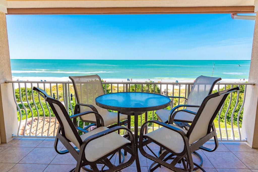 Start your mornings with coffee on your private balcony overlooking pristine turquoise waters and soft sandy shores—your own slice of beachfront paradise awaits.
