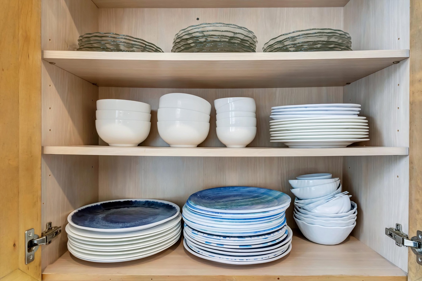 Everything you need awaits in your well-stocked kitchen, with beautiful dishes and serveware ready for your meals and gatherings.